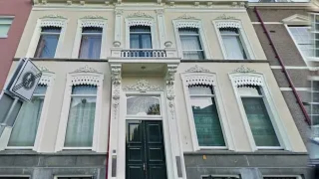 Regionieuws TV Brand in historisch pand aan de Prinsengracht in Den Haag, 14 woningen ontruimd